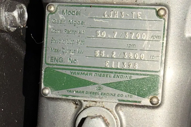Serendipity II Yacht Photos Pics Yanmar diesel engine plate on 2002 Hunter 460, model 4JH3-TE, showing specifications.