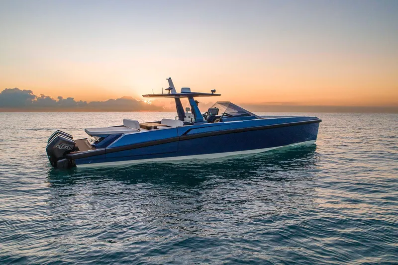 Rocket Yacht Photos Pics 2022 Wally Tender 48X yacht on calm sea at sunset.