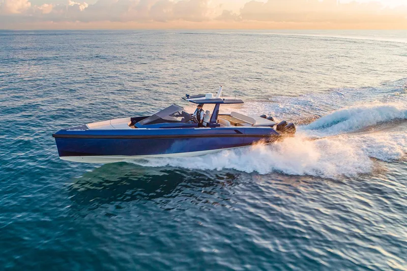 Rocket Yacht Photos Pics 2022 Wally Tender 48X cruising on open water at sunset.