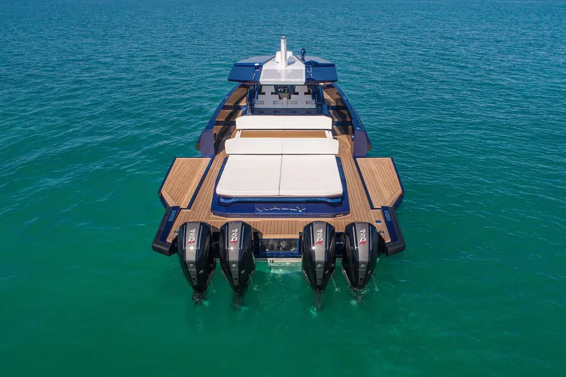 Rocket Yacht Photos Pics 2022 Wally Tender 48X luxury boat with four powerful outboard engines on open water.
