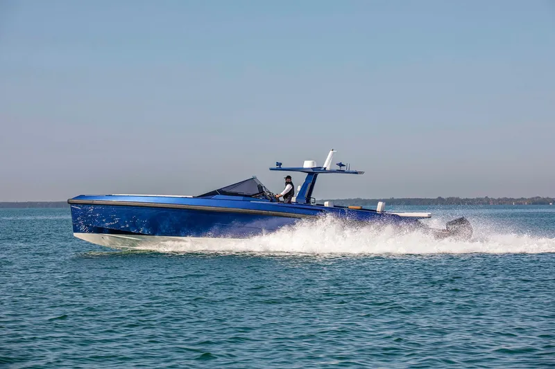 Rocket Yacht Photos Pics 2022 Wally Tender 48X yacht cruising on open water, showcasing sleek design and performance.