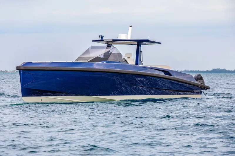 Rocket Yacht Photos Pics 2022 Wally Tender 48X luxury yacht on calm ocean waters.