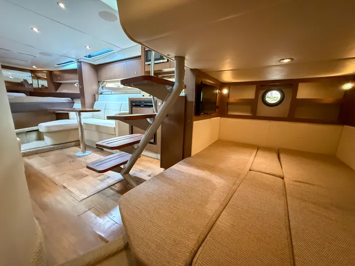  Yacht Photos Pics Interior of 2016 Sea Ray 350 Sundancer yacht, featuring cozy seating and modern design.
