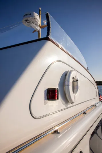 Huckins Yacht Corporation Yacht Photos Pics 1964 Huckins Out Islander 56 yacht, featuring sleek design and safety equipment.