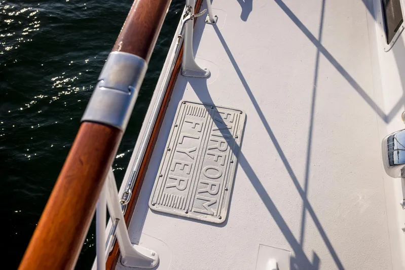 Huckins Yacht Corporation Yacht Photos Pics Deck of 1964 Huckins Out Islander 56 yacht with "Fairform Flyer" plaque.