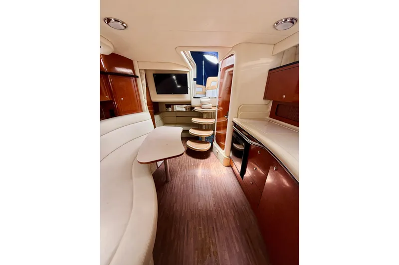  Yacht Photos Pics Interior of 2004 Sea Ray 320 Sundancer yacht with elegant seating and modern amenities.
