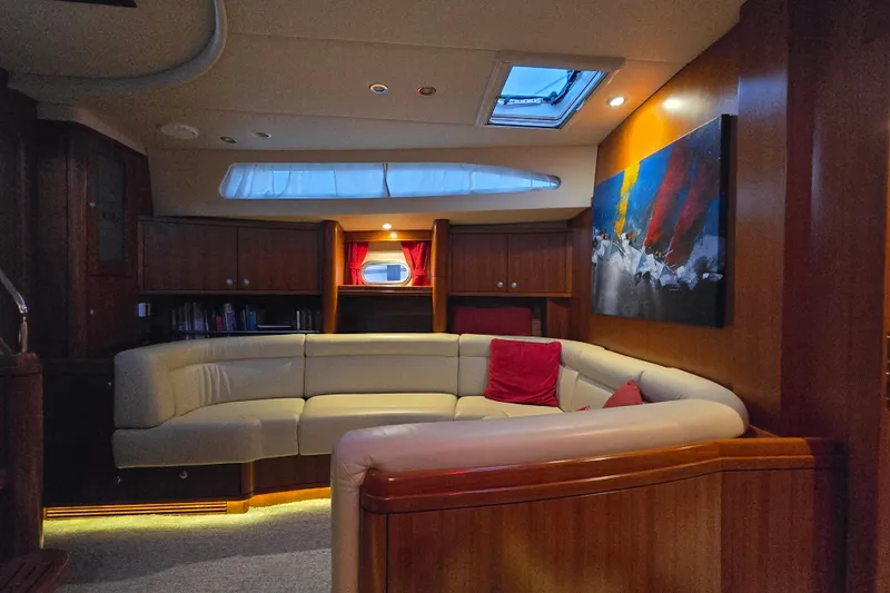 Kolea Yacht Photos Pics Luxurious interior of 2013 Ron Holland 50 yacht with elegant seating and modern decor.
