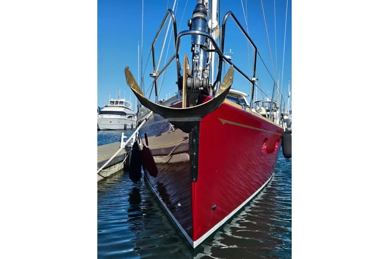 Kolea Yacht Photos Pics Red Ron Holland 50 yacht, 2013 model, docked in marina with clear blue sky.