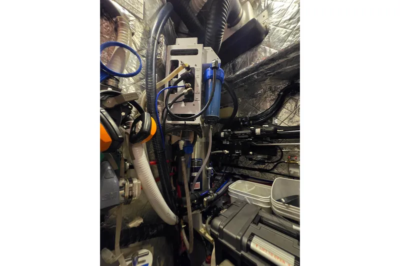 Kolea Yacht Photos Pics Engine room of a 2013 Ron Holland 50 yacht, featuring complex piping and equipment.