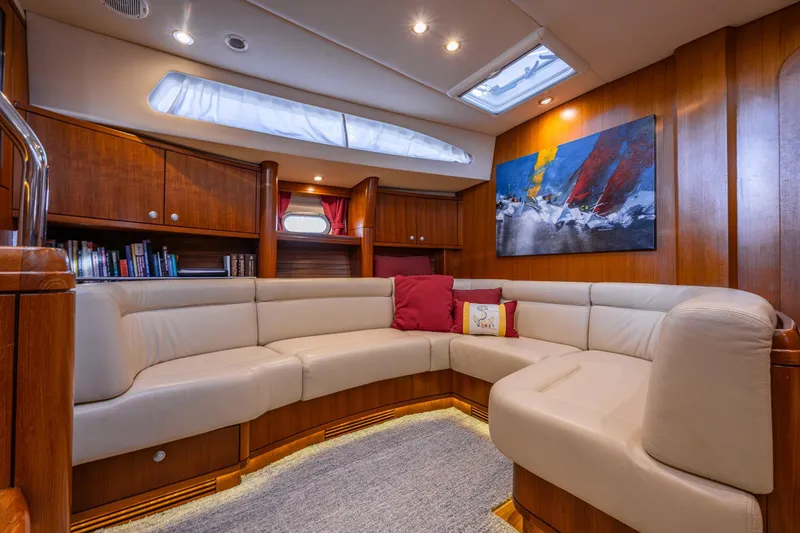 Kolea Yacht Photos Pics Luxurious interior of 2013 Ron Holland 50 yacht with plush seating and modern decor.