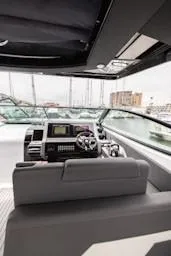 True Yacht Photos Pics 2020 Cruisers Yachts 38 GLS helm with modern controls and marina view.