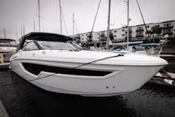 True Yacht Photos Pics 2020 Cruisers Yachts 38 GLS docked at marina, sleek white design.