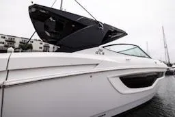 True Yacht Photos Pics 2020 Cruisers Yachts 38 GLS, sleek design, docked in marina.