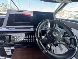 True Yacht Photos Pics 2020 Cruisers Yachts 38 GLS helm with modern controls and steering wheel.