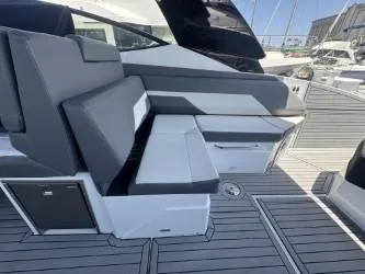 True Yacht Photos Pics 2020 Cruisers Yachts 38 GLS interior with sleek seating and modern design.