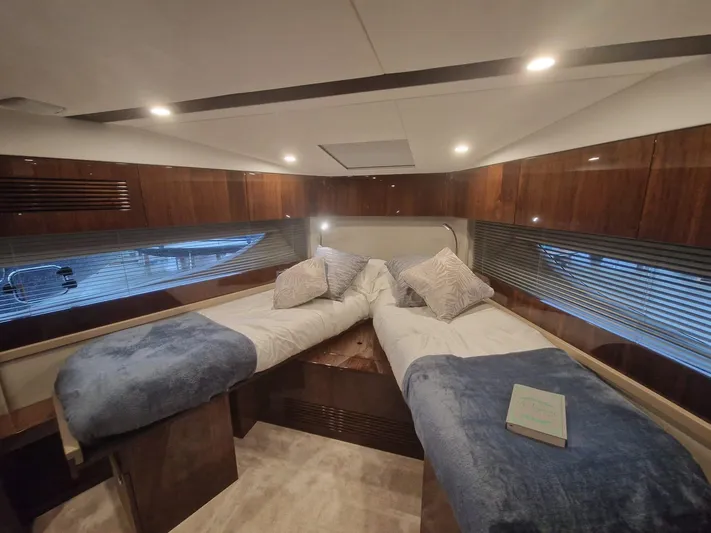 Seakeeper Gyro Yacht Photos Pics Luxurious cabin interior of 2022 Fairline Targa 45 GT yacht with twin beds.