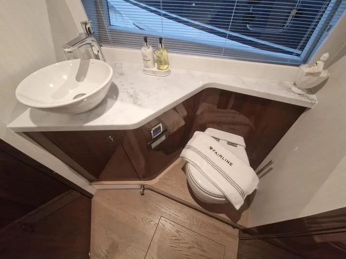 Seakeeper Gyro Yacht Photos Pics Luxury bathroom in 2022 Fairline Targa 45 GT yacht with modern fixtures.