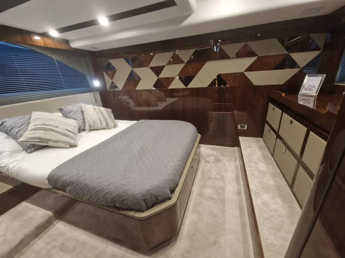 Seakeeper Gyro Yacht Photos Pics Luxurious interior of 2022 Fairline Targa 45 GT yacht bedroom with modern design.