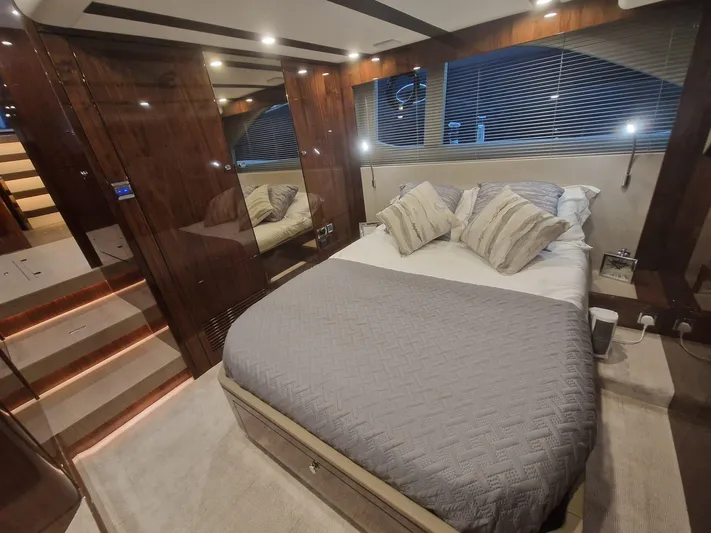 Seakeeper Gyro Yacht Photos Pics Luxurious bedroom interior of 2022 Fairline Targa 45 GT yacht with modern design.