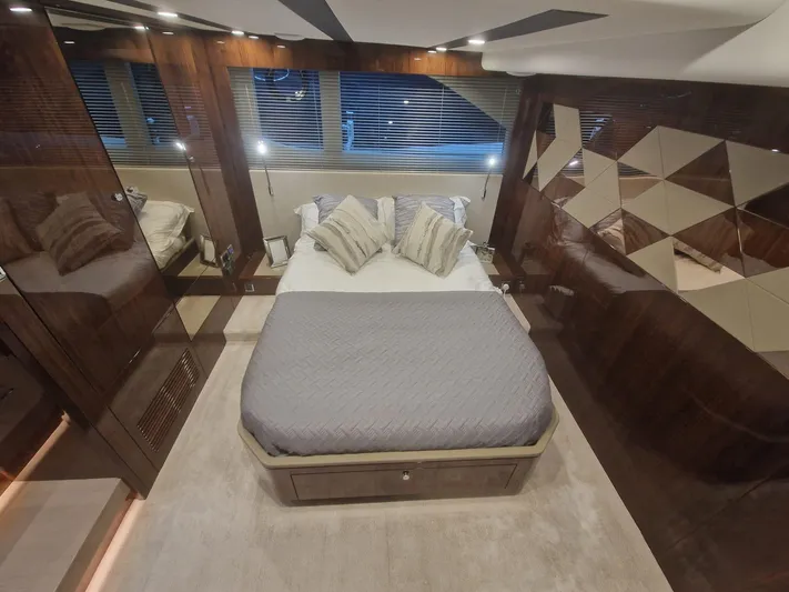 Seakeeper Gyro Yacht Photos Pics Luxurious bedroom interior of 2022 Fairline Targa 45 GT yacht with modern design elements.