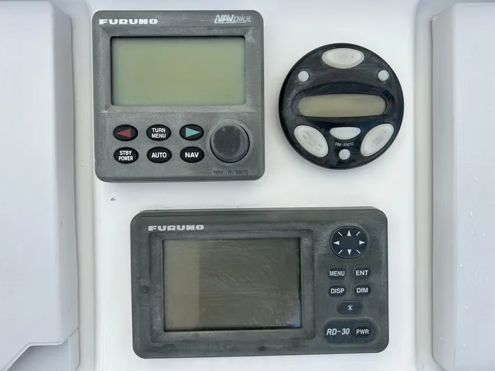 Overboard Yacht Photos Pics Furuno navigation and control instruments on a 2005 Intrepid 370 Cuddy boat.