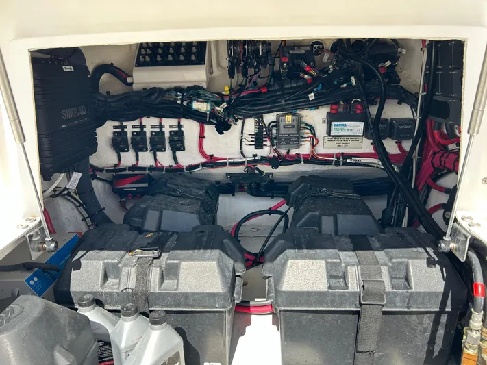 Overboard Yacht Photos Pics Electrical and battery compartment of a 2005 Intrepid 370 Cuddy boat.