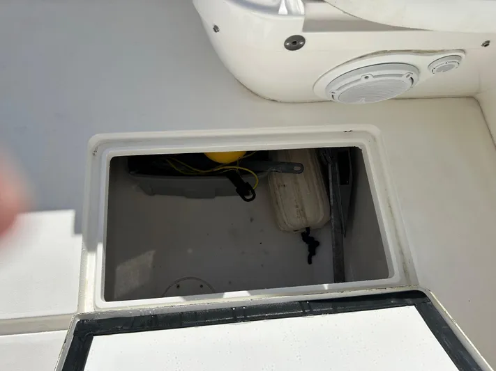 Overboard Yacht Photos Pics Open storage compartment on a 2005 Intrepid 370 Cuddy boat.
