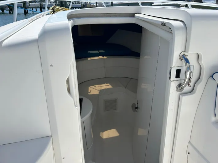 Overboard Yacht Photos Pics 2005 Intrepid 370 Cuddy cabin entrance with open door.