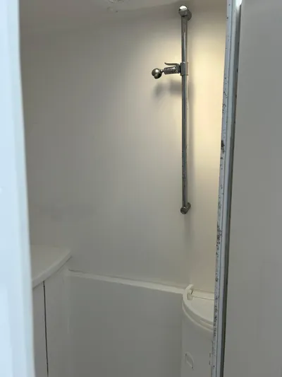 Overboard Yacht Photos Pics 2005 Intrepid 370 Cuddy boat interior shower area.