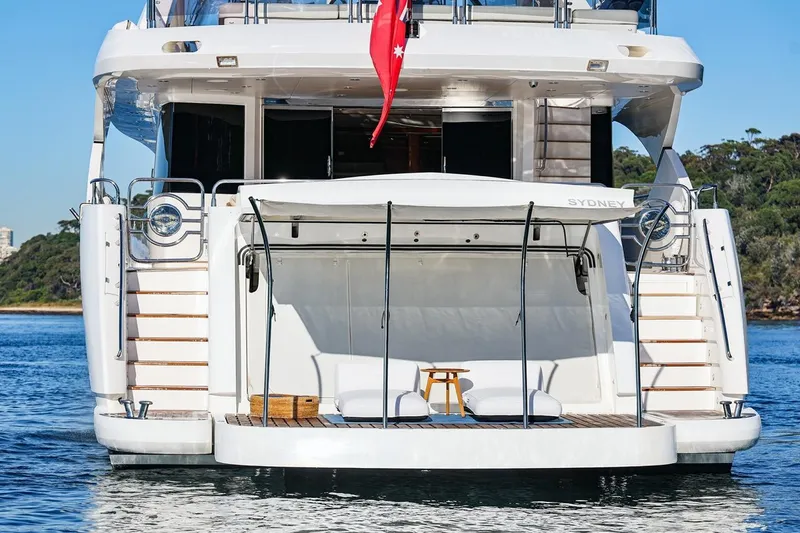 Frivolous Yacht Photos Pics Luxury Sunseeker 34 Metre Yacht, 2009 model, docked with elegant rear deck view.