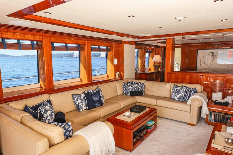 Frivolous Yacht Photos Pics Luxurious interior of 2009 Sunseeker 34 Metre Yacht with elegant seating and ocean view.