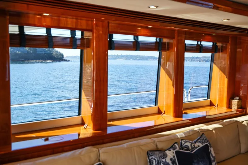 Frivolous Yacht Photos Pics Luxurious interior view from 2009 Sunseeker 34 Metre Yacht, overlooking serene ocean waters.