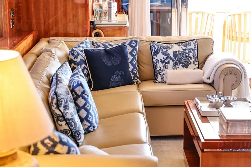 Frivolous Yacht Photos Pics Luxurious Sunseeker 34 Metre Yacht 2009 interior with elegant beige sofa and patterned cushions.