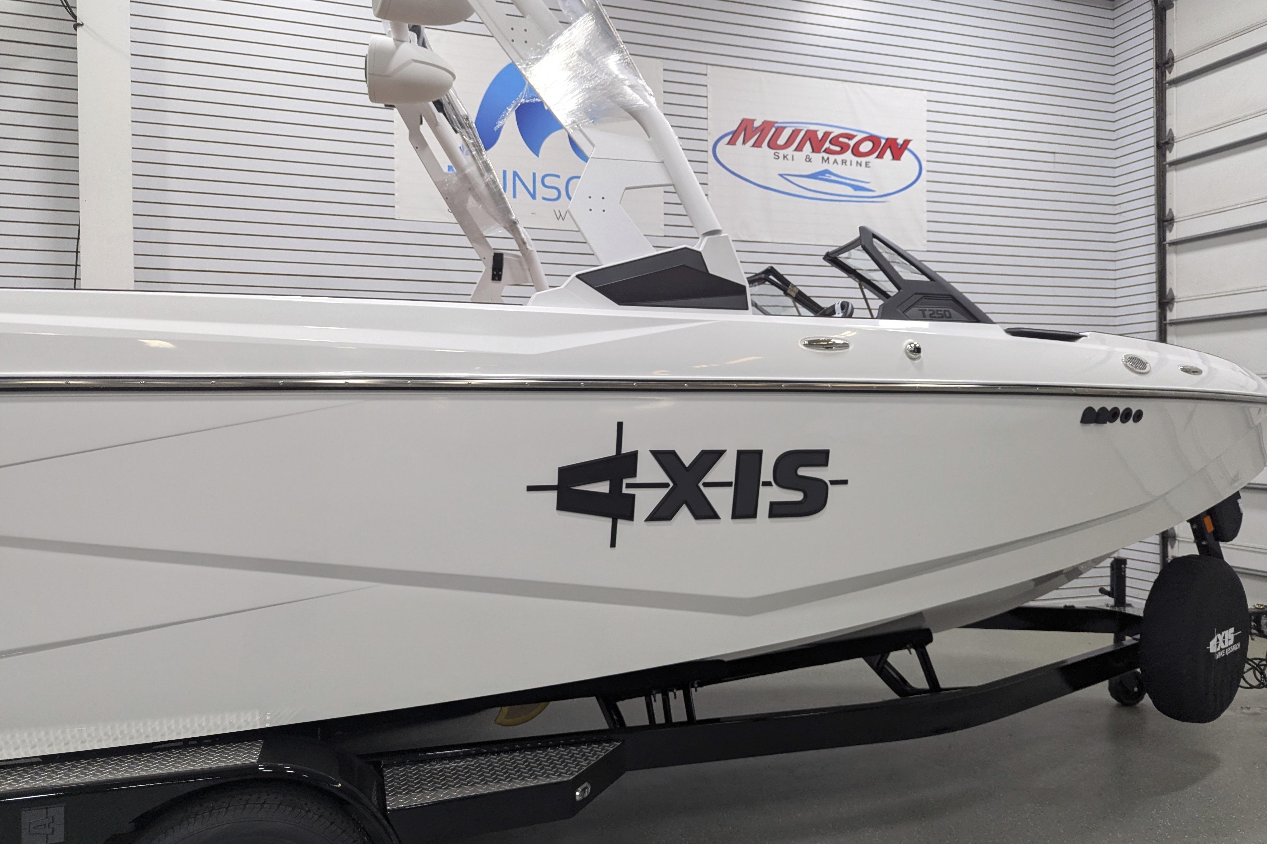 2026 Axis T250 boat displayed indoors at Munson Ski & Marine showroom.