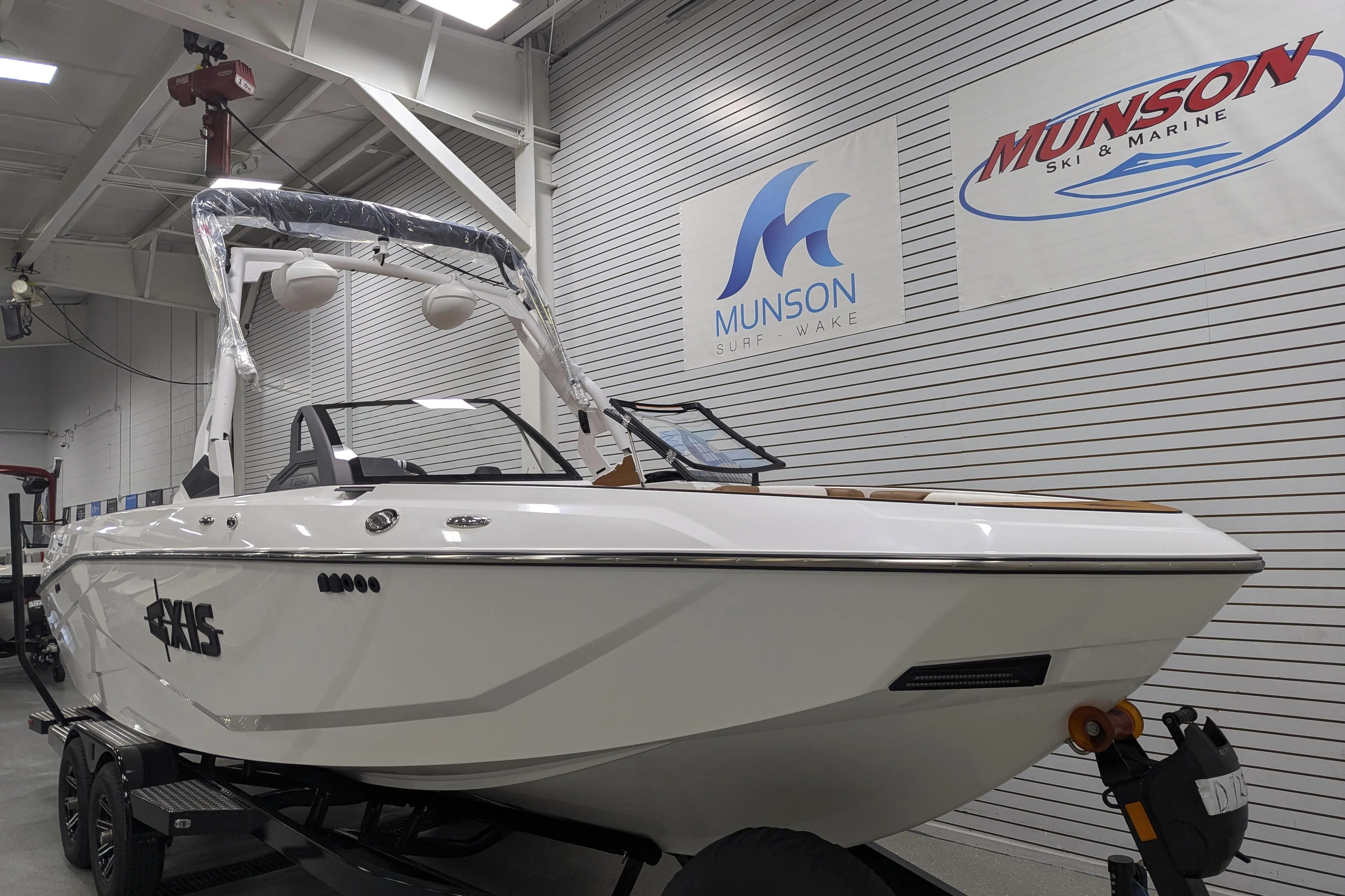 2026 Axis T250 boat displayed at Munson Ski & Marine showroom.