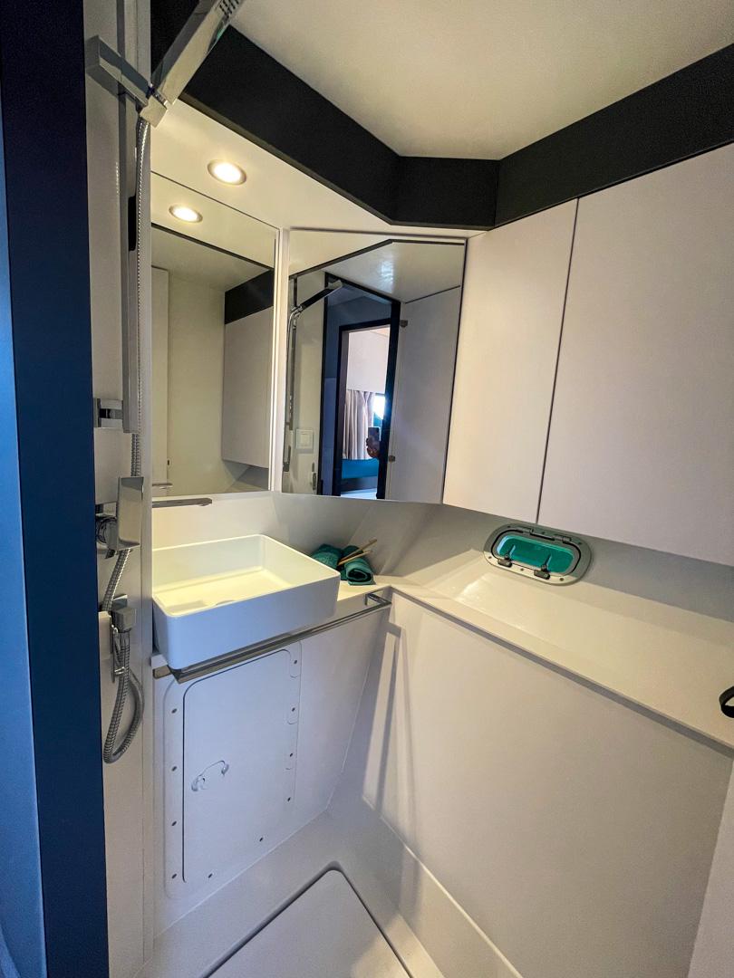 Modern bathroom in 2025 Windelo 54 yacht with sleek design and ample storage.