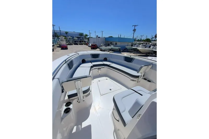 300-115 Yacht Photos Pics 2025 Robalo R300 Center Console boat with spacious seating and modern design.