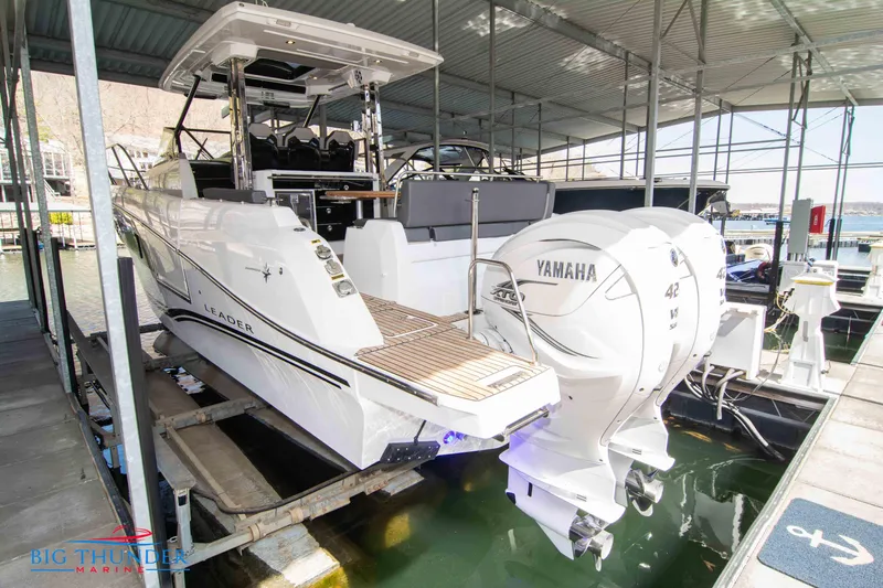  Yacht Photos Pics 2024 Jeanneau Leader 10.5 WA with twin Yamaha engines docked in marina.