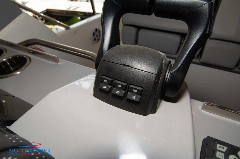  Yacht Photos Pics 2024 Jeanneau Leader 10.5 WA throttle control on boat dashboard.