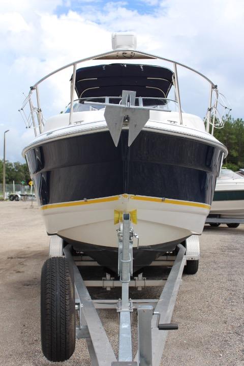2005 Larson Cabrio 240 boat on a trailer, front view.
