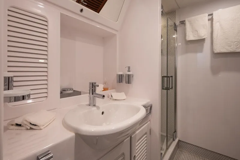 Playmobil Yacht Photos Pics Luxurious bathroom on 1990 One Off Brandst&auml;tter 31m Motor Sailor, featuring modern sink and shower.