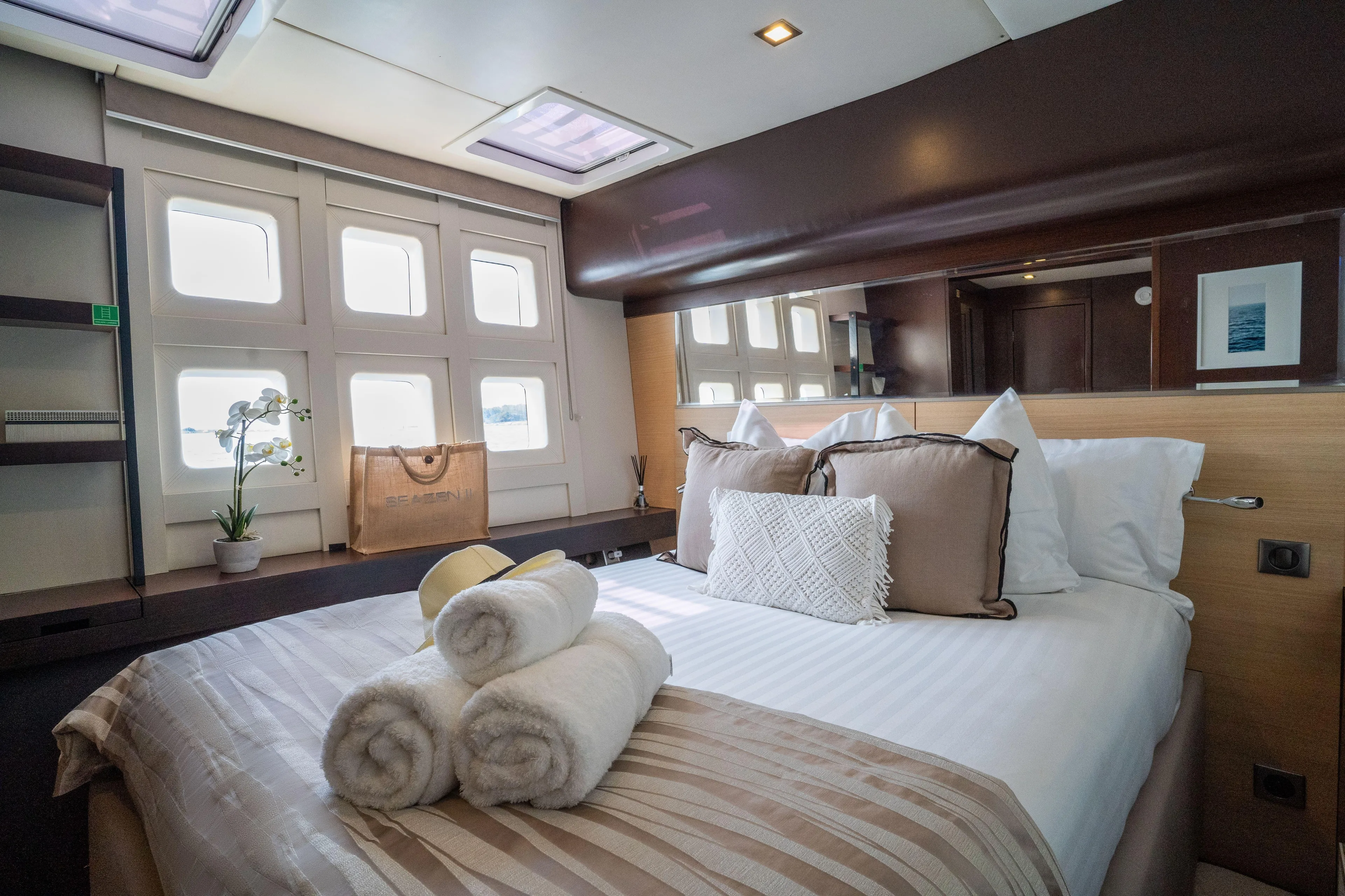 Seazen II Yacht Photos Pics Luxurious Sunreef 70 yacht bedroom interior, 2008 model, with elegant decor and natural light.