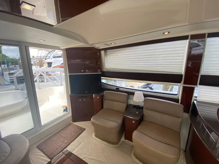 Sea Shack Yacht Photos Pics Luxurious interior of 2013 Meridian 391 yacht with plush seating and modern design.