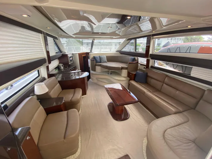 Sea Shack Yacht Photos Pics Luxurious interior of 2013 Meridian 391 yacht with plush seating and modern design.