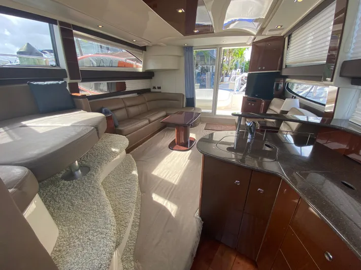 Sea Shack Yacht Photos Pics Luxurious interior of 2013 Meridian 391 yacht with modern furnishings and spacious layout.