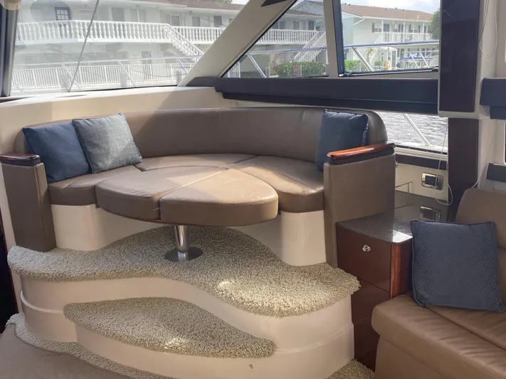 Sea Shack Yacht Photos Pics Luxurious interior of 2013 Meridian 391 yacht with plush seating and elegant design.