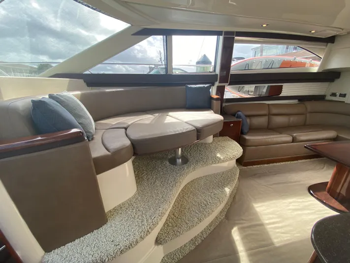 Sea Shack Yacht Photos Pics Luxurious interior of 2013 Meridian 391 yacht with plush seating and modern design.