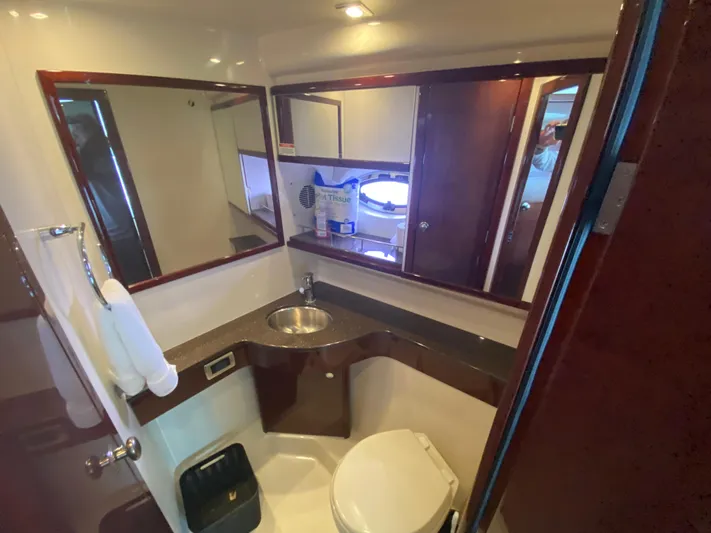 Sea Shack Yacht Photos Pics Luxurious bathroom in 2013 Meridian 391 yacht with modern fixtures and elegant design.