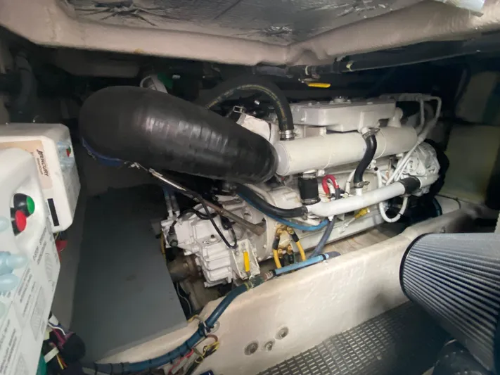 Sea Shack Yacht Photos Pics Engine compartment of a 2013 Meridian 391 boat, showcasing mechanical components.