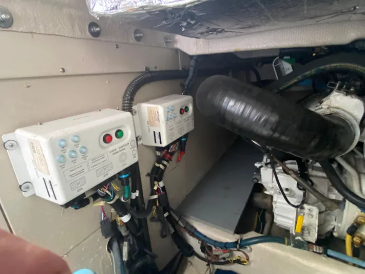 Sea Shack Yacht Photos Pics Engine room of 2013 Meridian 391 with control panels and wiring.